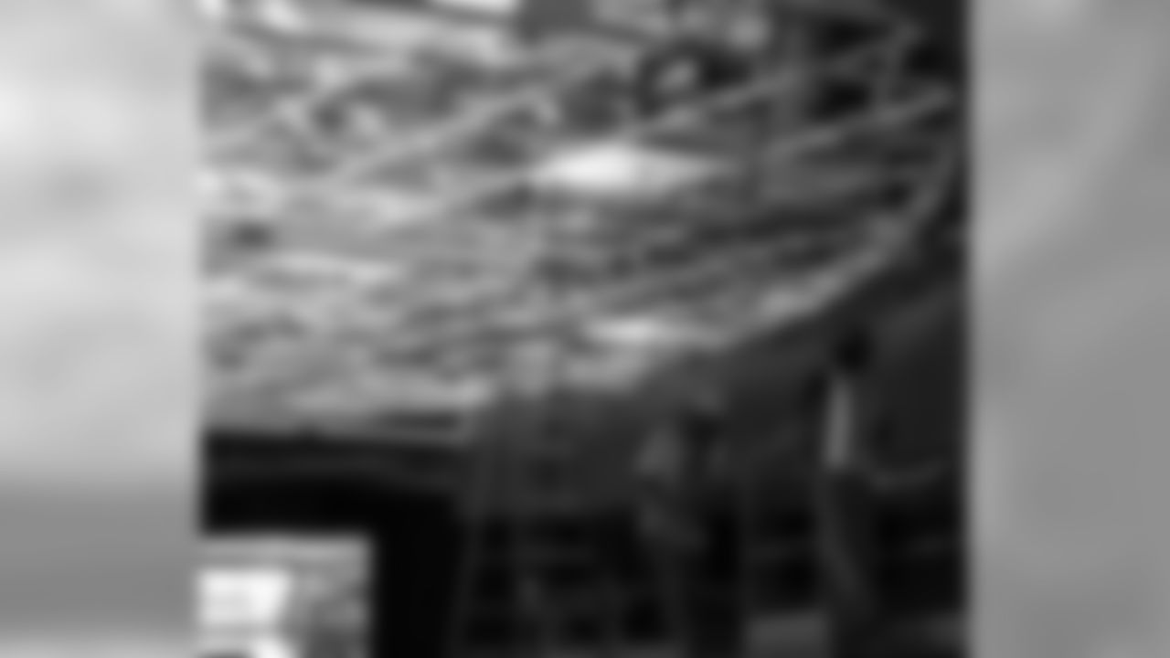 The new weight room's signature ceiling design begins to take shape.