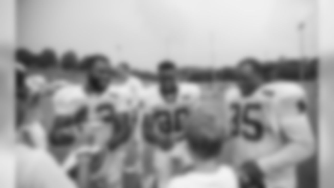 RB Fozzy Whittaker, RB Jordan Todman and FB Mike Tolbert