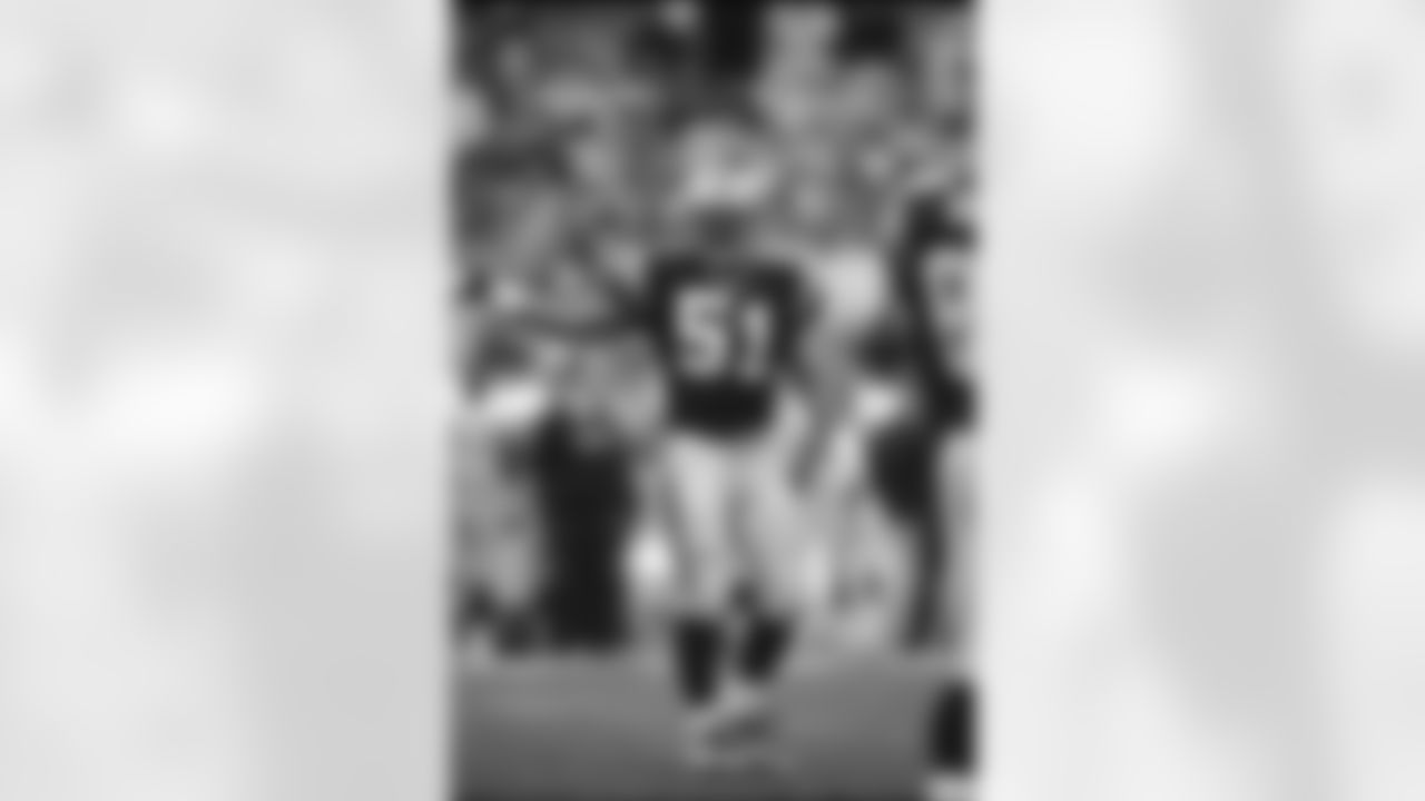 Sam Mills played for Carolina from 1995-97, then served as an assistant coach from 1998-2004.