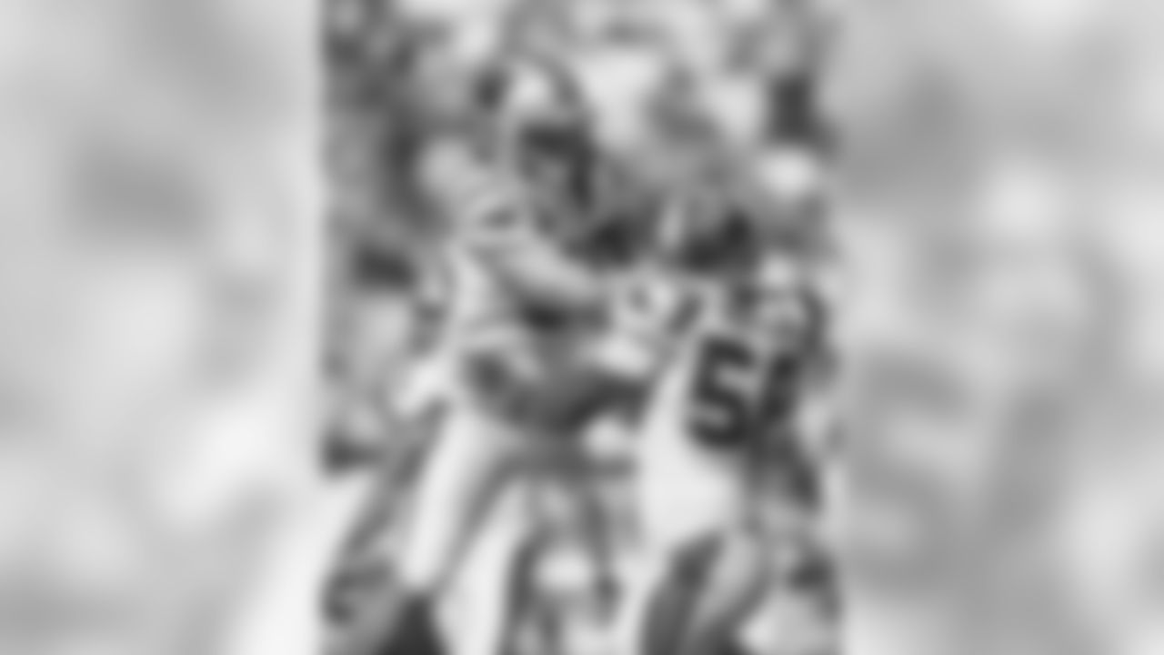 LBs A.J. Klein and Thomas Davis, Sr.