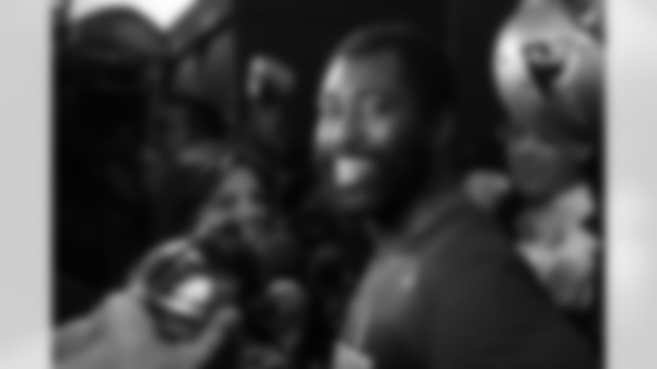 Darrelle Revis talks with the media