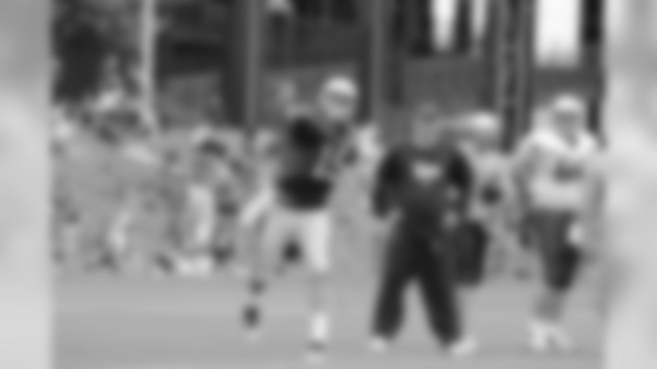 Rookie Ryan Mallett throws a pass during training camp drills