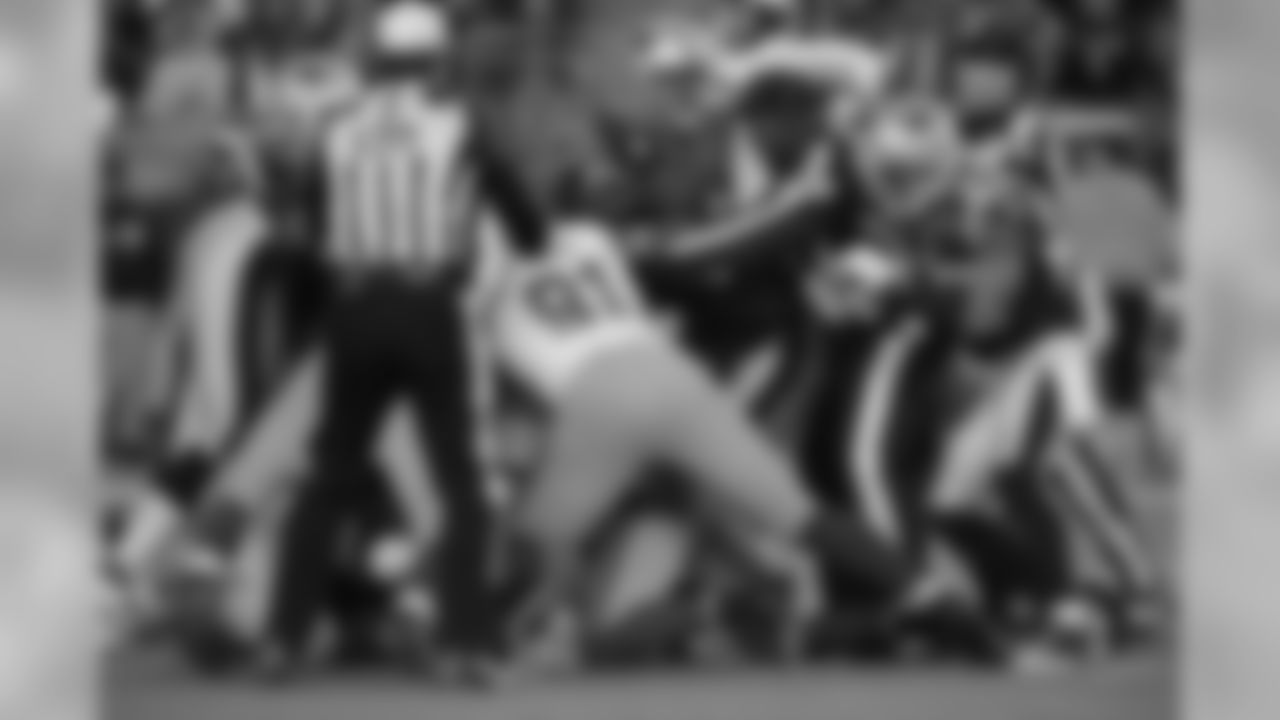 The Patriots and Giants scuffle during the second quarter at Gillette Stadium on Sunday, November 6, 2011.
