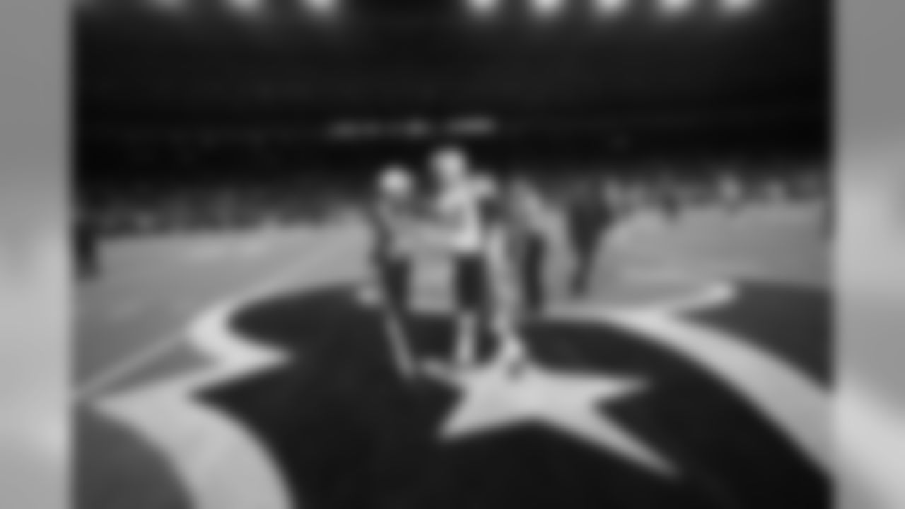 New England Patriots quarterback Tom Brady (12) greets an official before an NFL football game against the Houston Texans Sunday, Dec. 1, 2019, in Houston. (AP Photo/David J. Phillip)