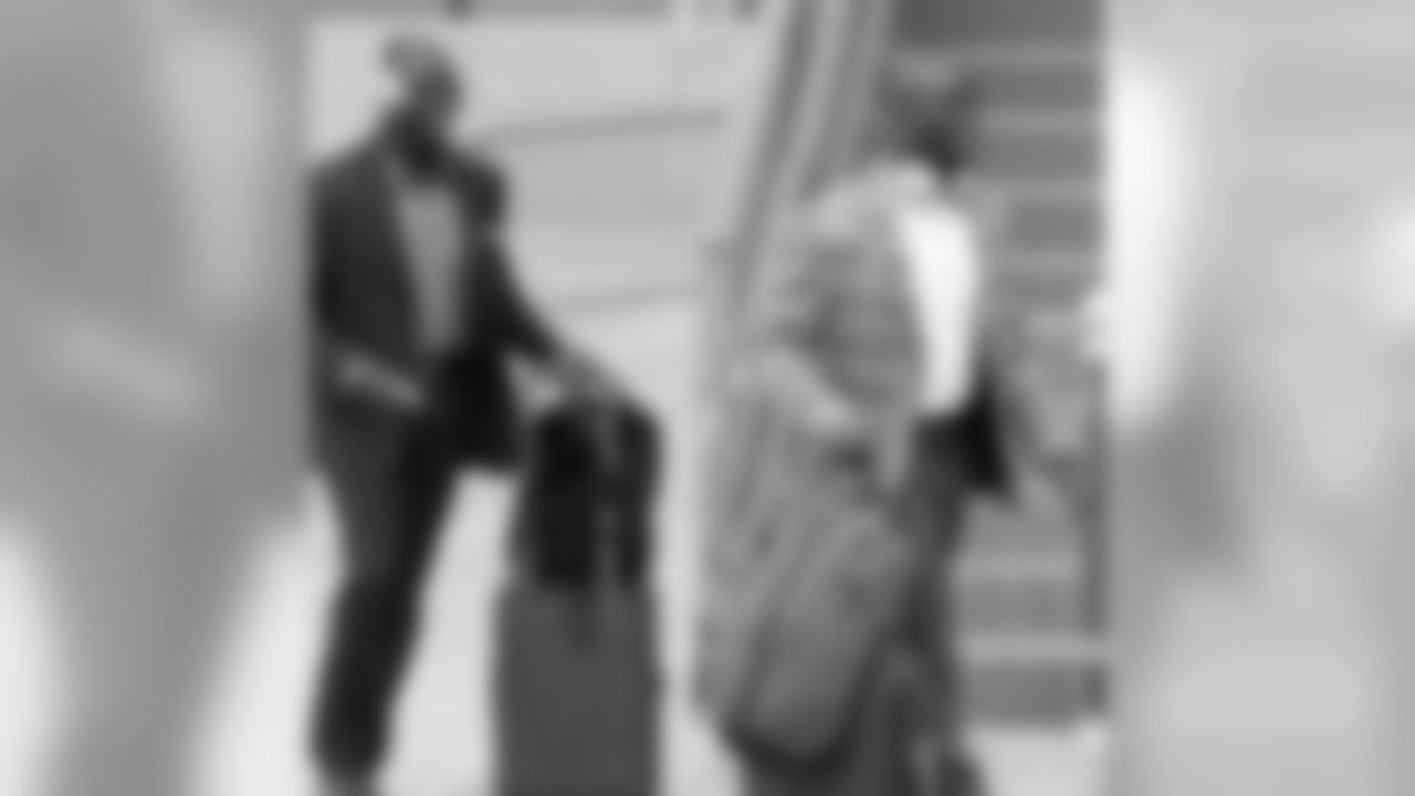 Devin (left) and Jason McCourty suit up on their way to Jacksonville.