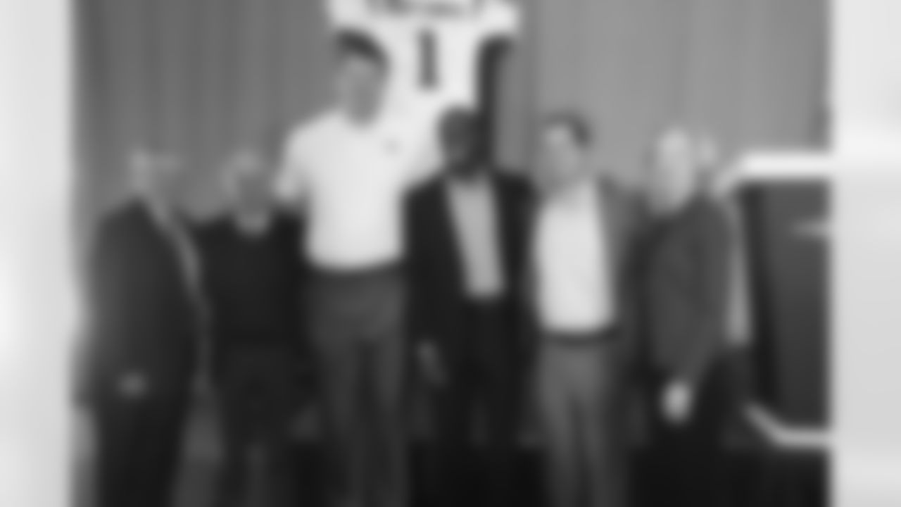 Nate Solder and Devin McCourty pose for a group photo
