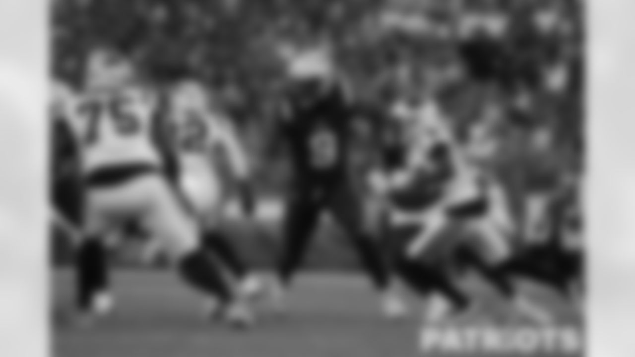 Matthew Judon (9) rushing Cam Erving (75) for the Carolina Panthers