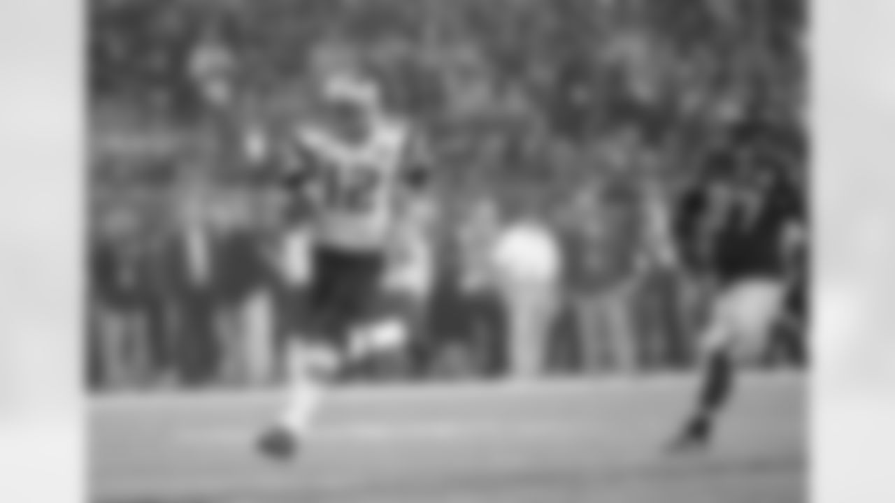 New England Patriots' Tom Brady runs against the Atlanta Falcons during the second half of the NFL Super Bowl 51 football game Sunday, Feb. 5, 2017, in Houston. (AP Photo/Tony Gutierrez)