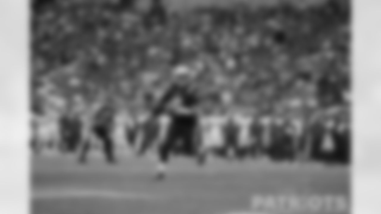 Brian Hoyer (5) escaping the pocket.