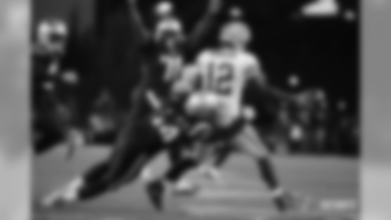 Adrian Clayborn and Aaron Rodgers