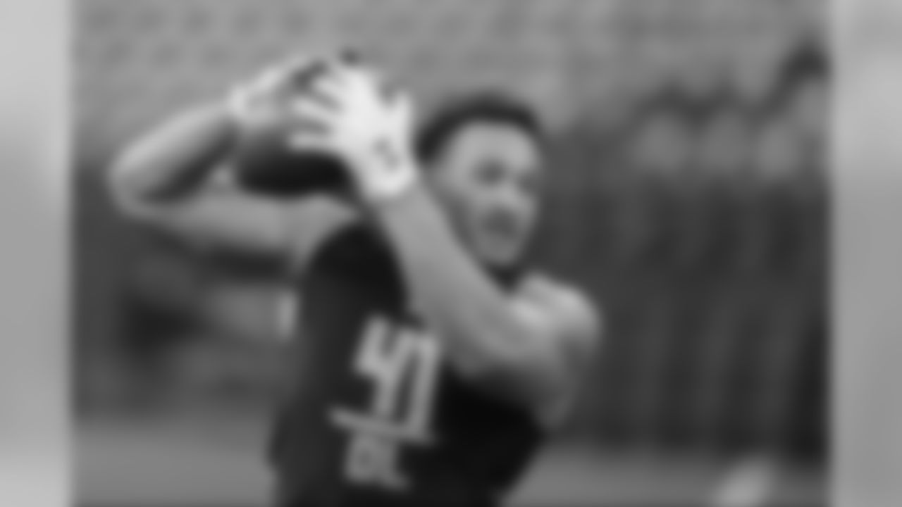Youngstown defensive end Derek Rivers runs a drill at the NFL football scouting combine in Indianapolis, Sunday, March 5, 2017. (AP Photo/Michael Conroy)