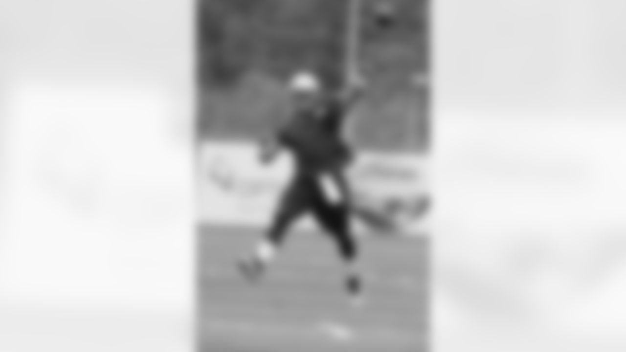 Tim Tebow fires a pass at Mini-Camp