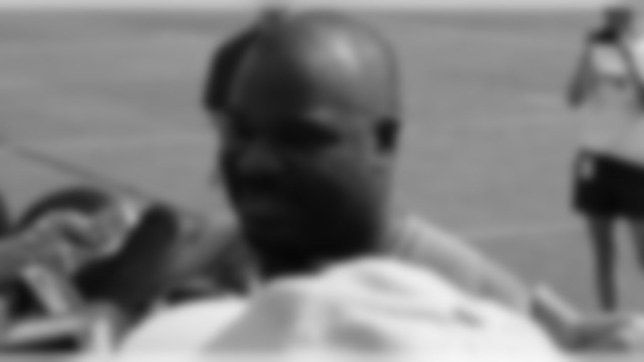 Albert Haynesworth talks with the media