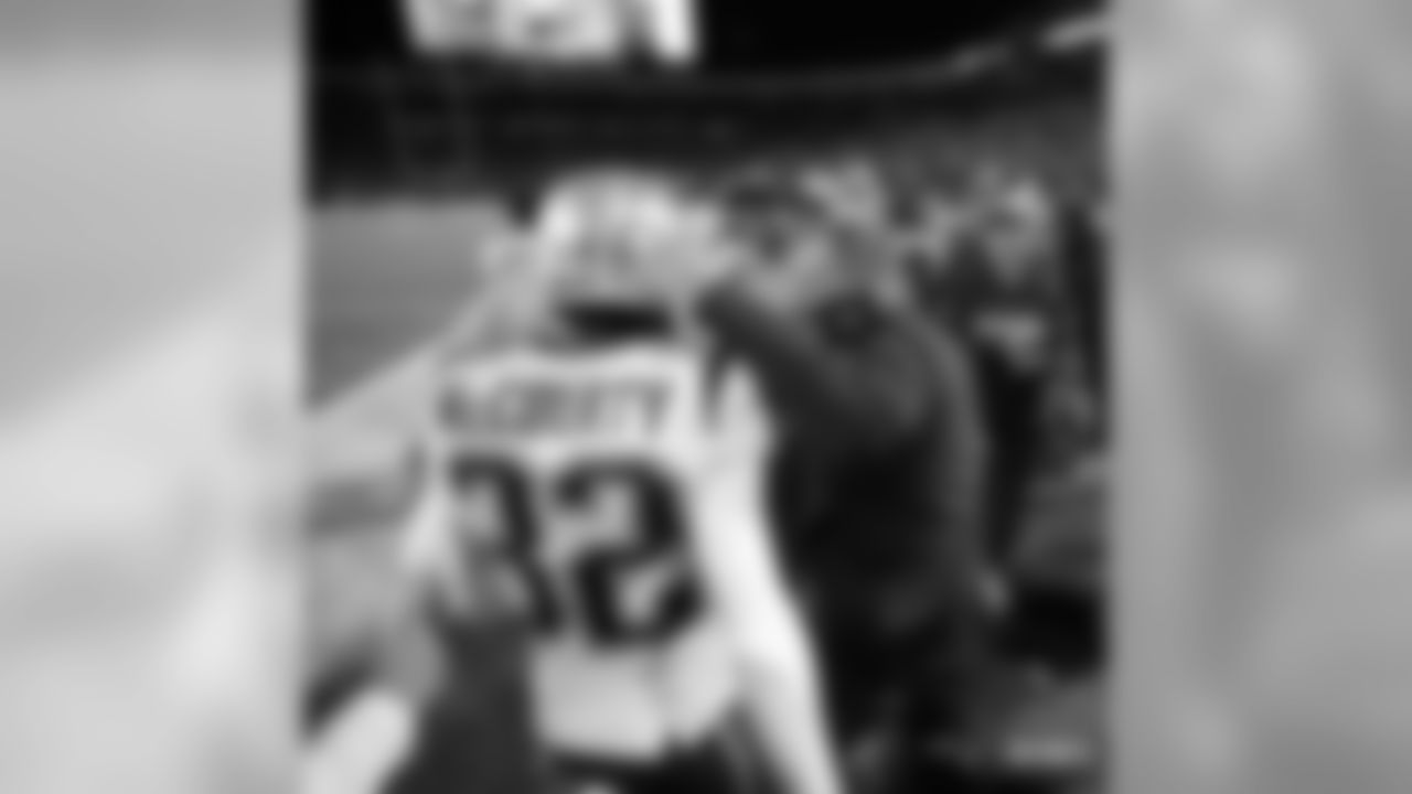 Devin McCourty and Bill Belichick
