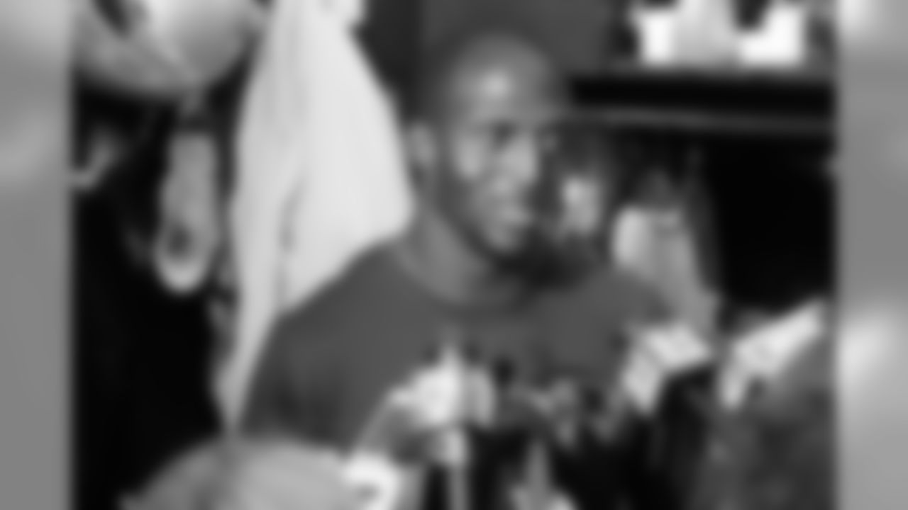 Devin McCourty talks with the media