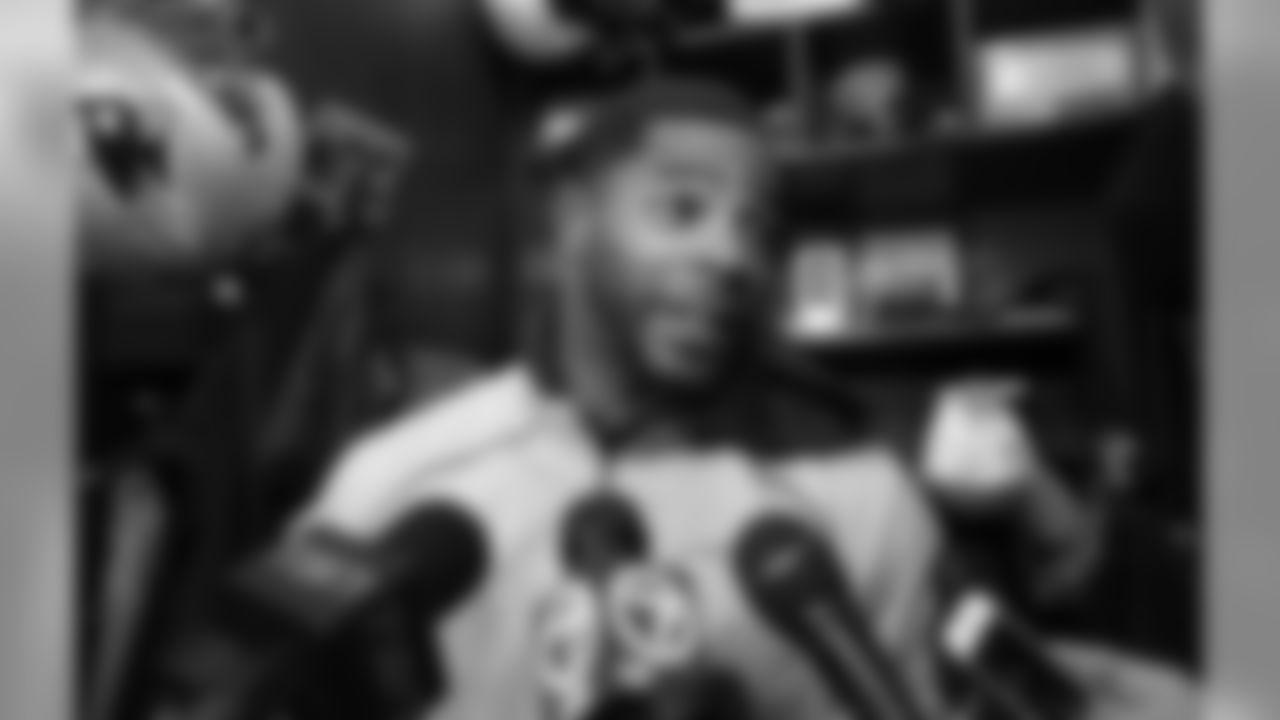 New England Patriots cornerback Malcolm Butler faces reporters in the team's locker room following an NFL football team practice, Thursday, Jan. 26, 2017, in Foxborough, Mass. The Patriots are to play the Atlanta Falcons in Super Bowl LI, Feb. 5, 2017, in Houston. (AP Photo/Steven Senne)
