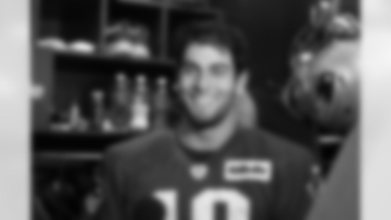 Jimmy Garoppolo speaks with the media
