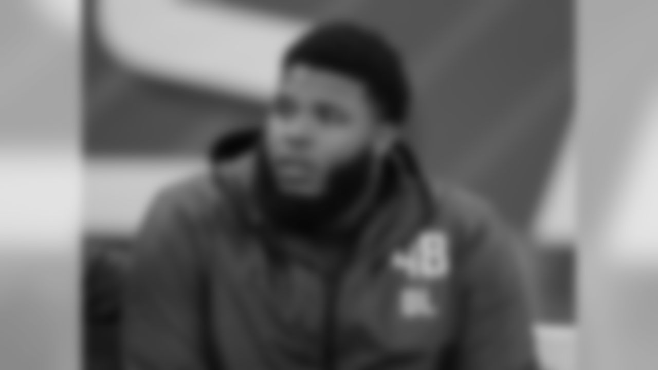Georgia offensive lineman Isaiah Wynn watches during the NFL football scouting combine, Friday, March 2, 2018, in Indianapolis. (AP Photo/Darron Cummings)