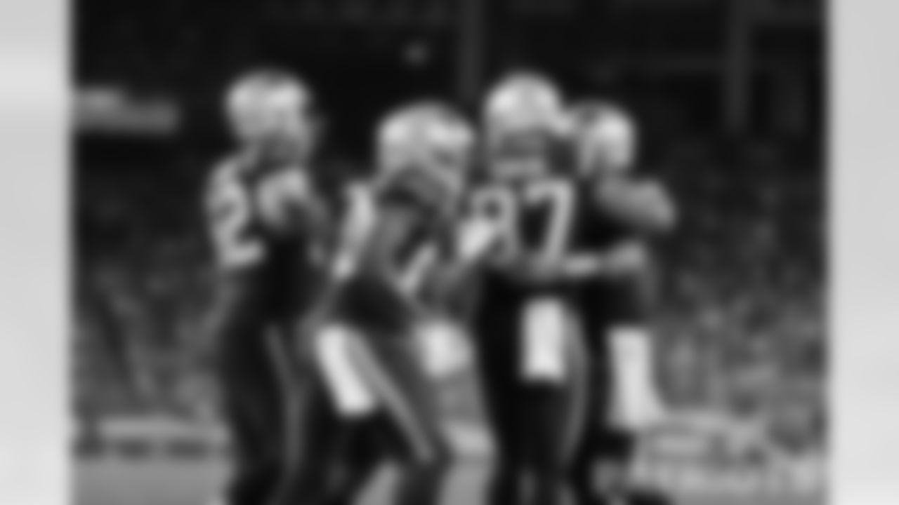 Matt Sokol (87) and teammates celebrate.