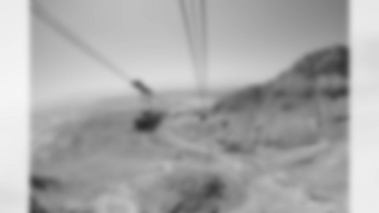 Cable cars pass each other on the ride to the top of the mountain at Masada.