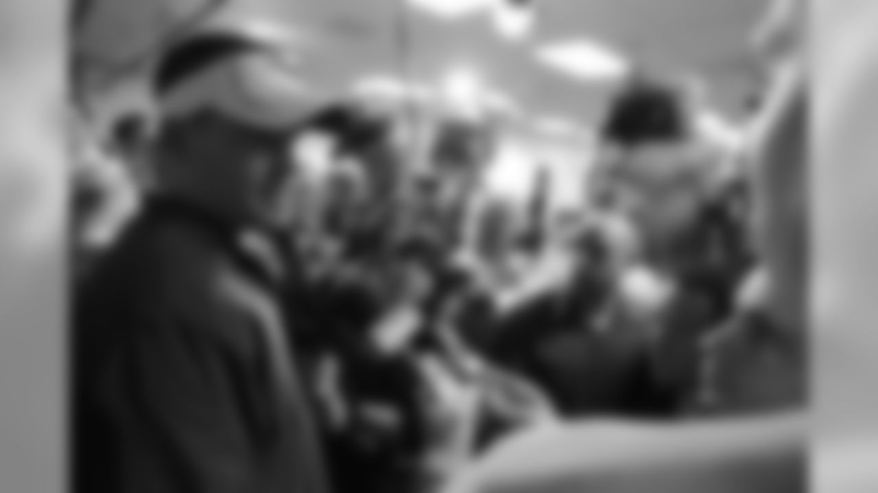 Offensive Coordinator Josh McDaniels talks with the media