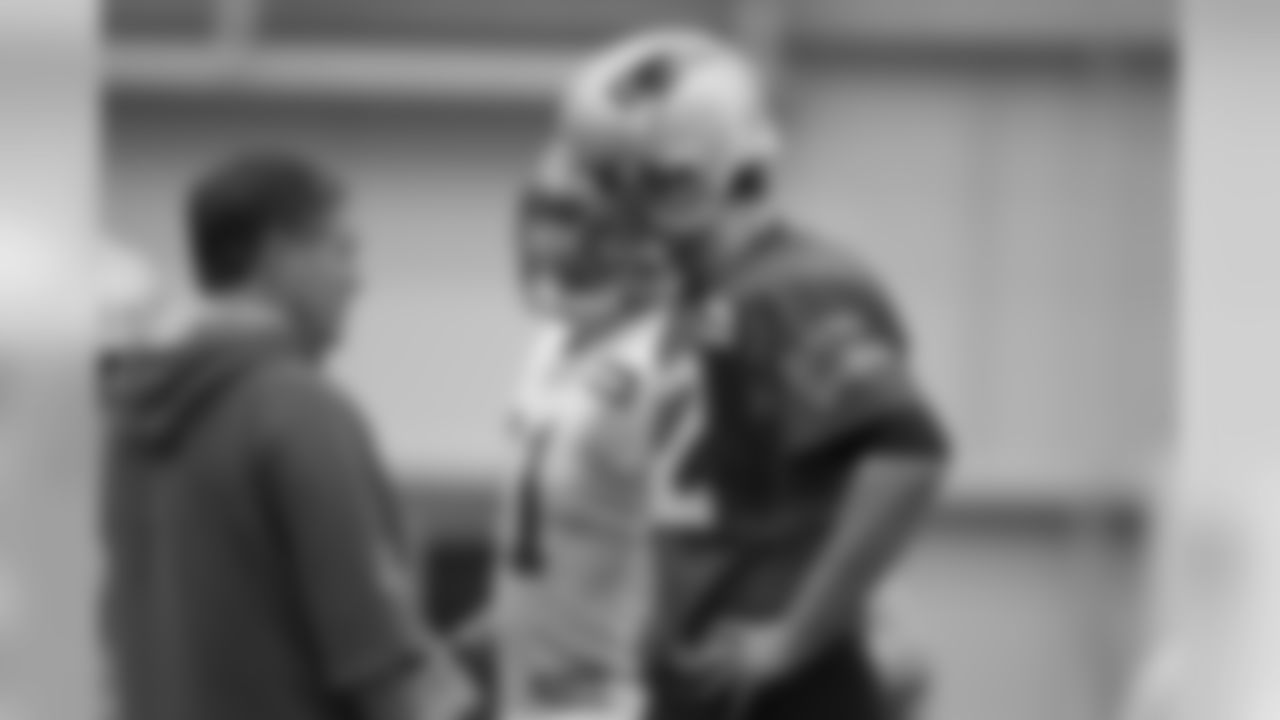 Tom Brady chats with Bill Belichick