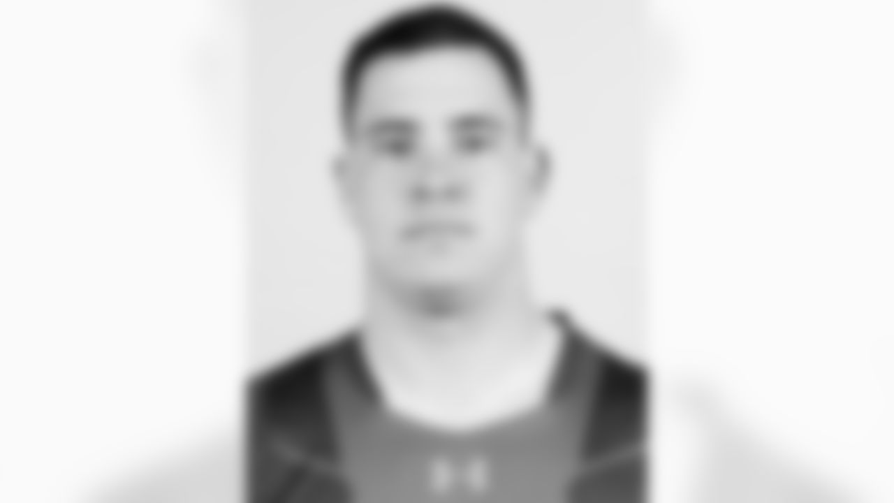 Navy long snapper Joe Cardona poses for a headshot during the 2015 NFL Scouting Combine at Lucas Oil Stadium on Wednesday, February 18, 2015 in Indianapolis, IN. (AP Photo/Ben Liebenberg)
