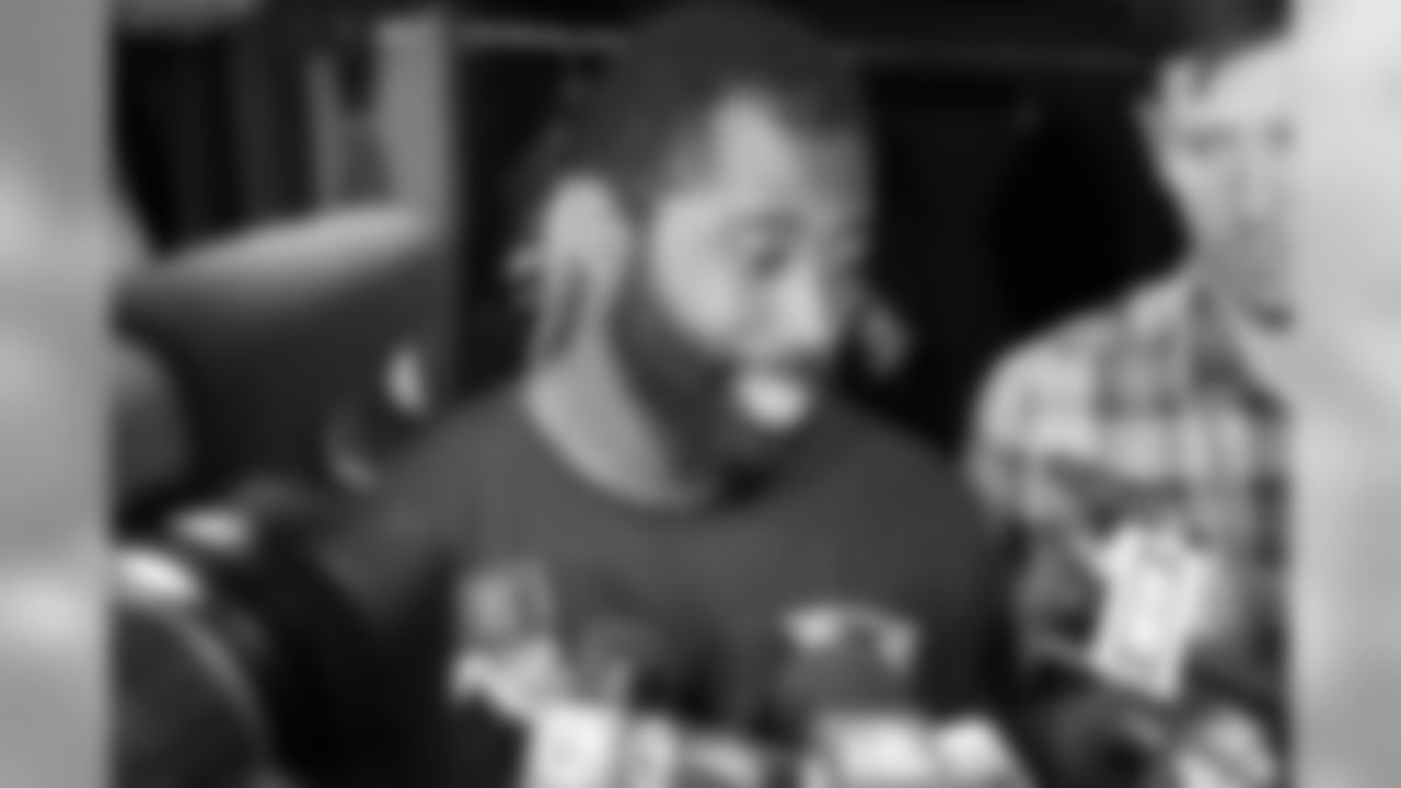 Darrelle Revis talks with the media