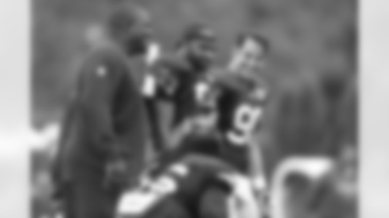 Pepper Johnson, Jerod Mayo and Niko Koutouvides