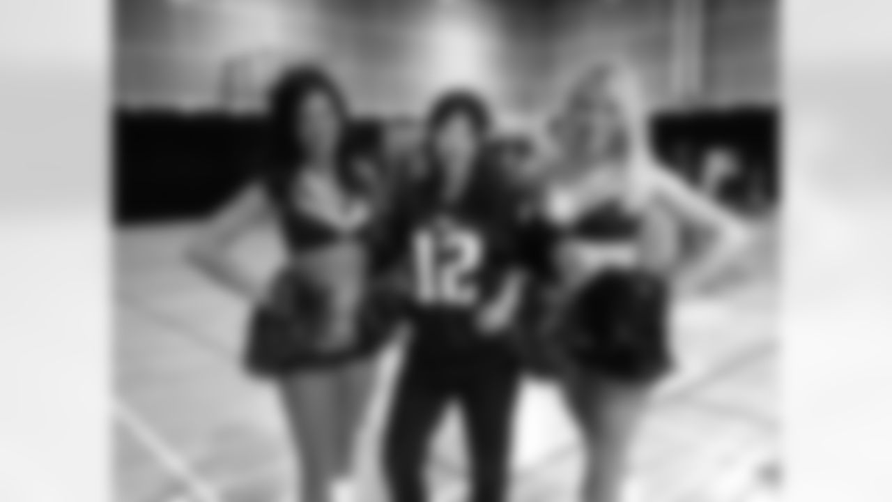 Patricia and Caitie posing with a Pats fan.