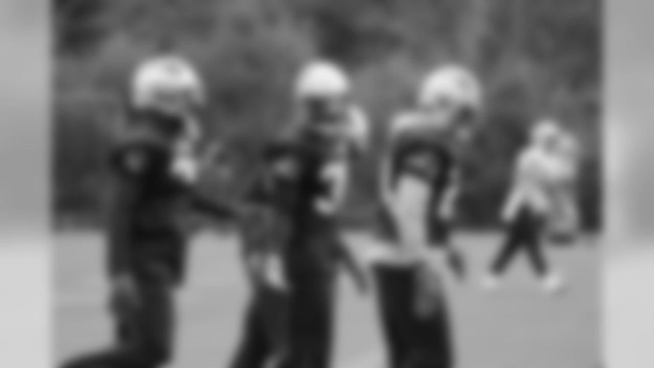 Duron Harmon and the DBs warming up before practice