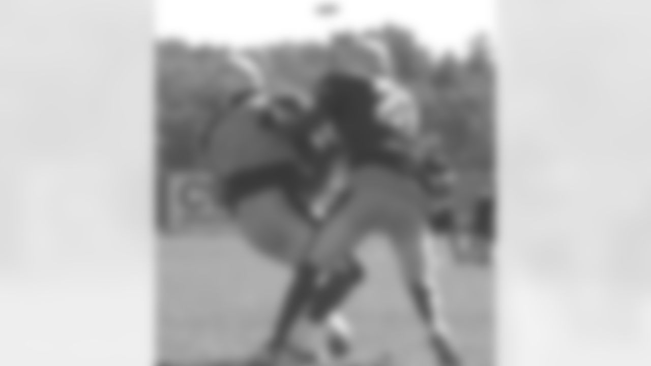 Cornerback Ellis Hobbs(27) makes a tackle during the morning practice on Wednesday, August 16. Photo by Chris Ferreira