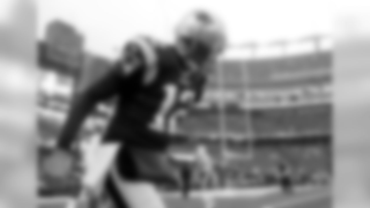 New England Patriots quarterback Tom Brady warms up before an NFL football game against the New York Jets, Saturday, Dec. 24, 2016, in Foxborough, Mass. (AP Photo/Charles Krupa)