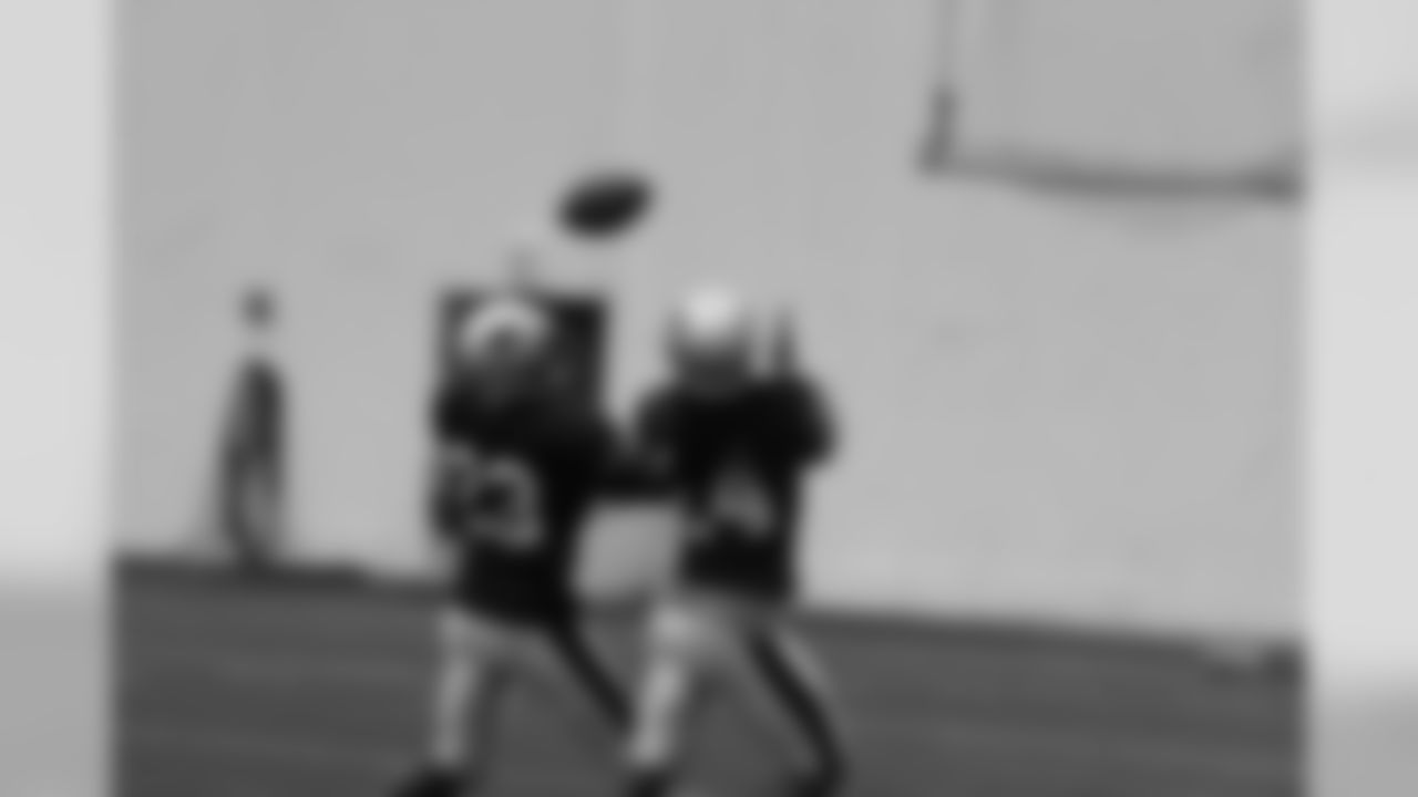 Leigh Bodden defends a pass during training camp practice