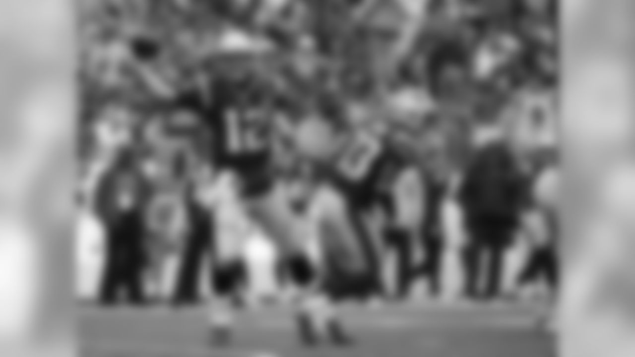 New England Patriots quarterback Tom Brady passes against the Los Angeles Chargers during the first half of an NFL football game, Sunday, Oct. 29, 2017, in Foxborough, Mass. (AP Photo/Steven Senne)