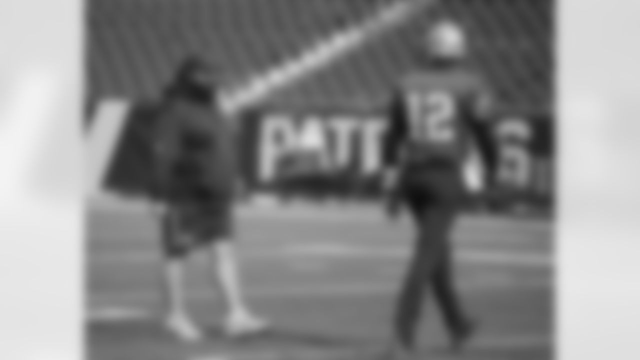 New England Patriots defensive coordinator Matt Patricia, left, speaks with quarterback Tom Brady (12) during an NFL football practice, Tuesday, Jan. 9, 2018, at Gillette Stadium, in Foxborough, Mass. The Patriots are scheduled to host the Tennessee Titans in an NFL divisional football AFC playoff game, Saturday, Jan. 13, 2018, in Foxborough. (AP Photo/Steven Senne)