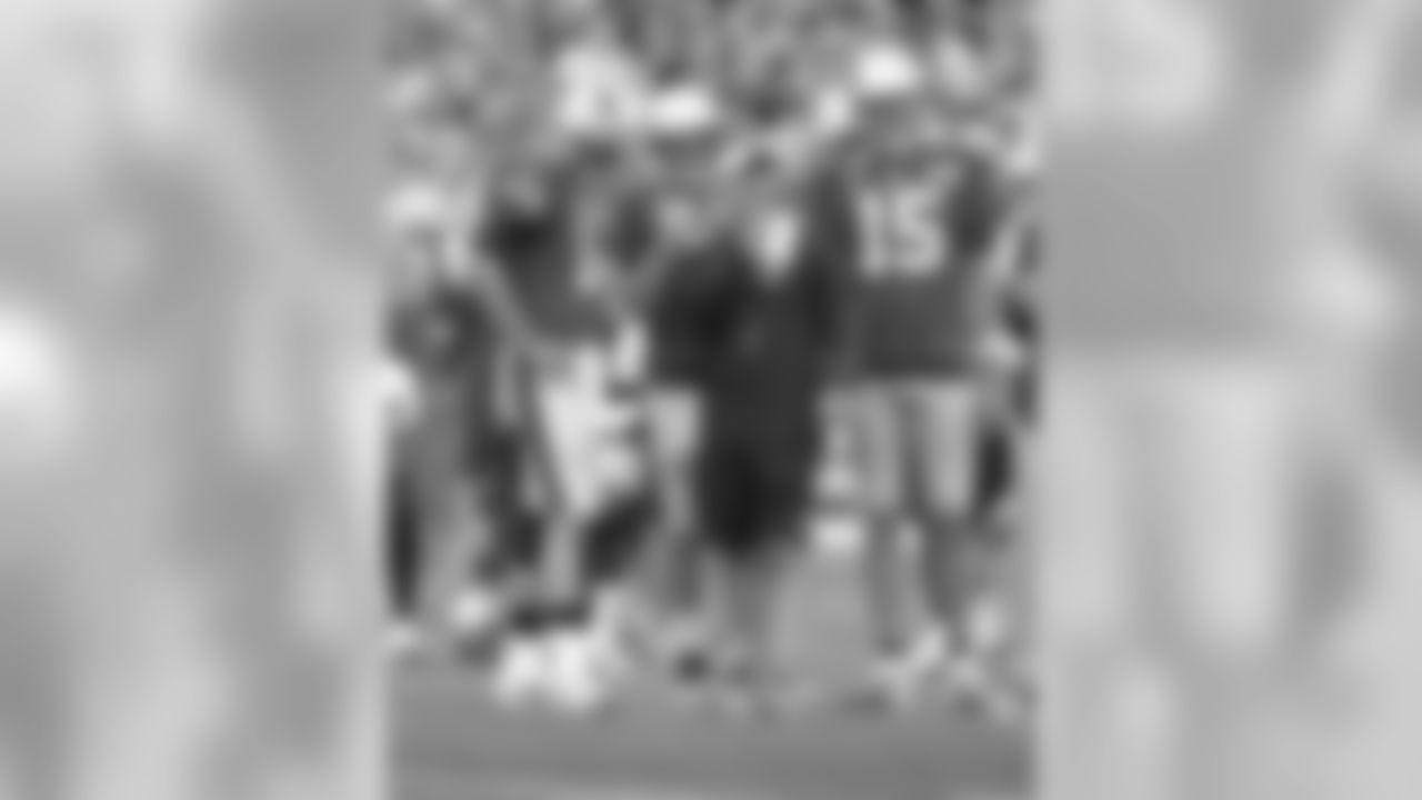 Josh McDaniels with the quarterbacks