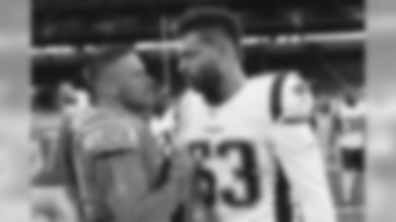 Detroit Lions wide receiver Danny Amendola, left, greets New England Patriots middle linebacker Kyle Van Noy, a former teammate, after a preseason NFL football game Thursday, Aug. 8, 2019, in Detroit. (AP Photo/Paul Sancya)