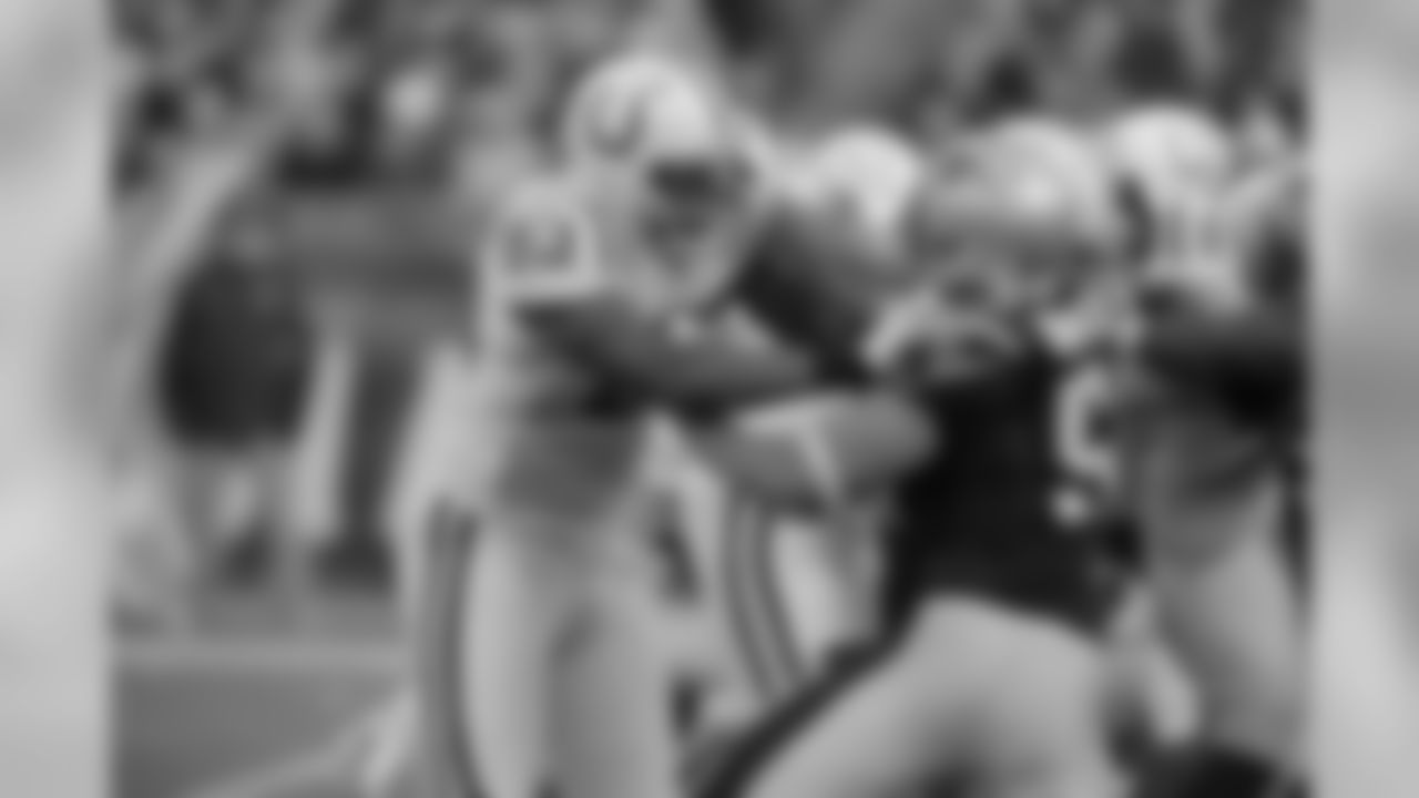 Patriots LB Rob Ninkovich fights for positioning versus the Indianapolis Colts on Sunday, December 4, 2011.