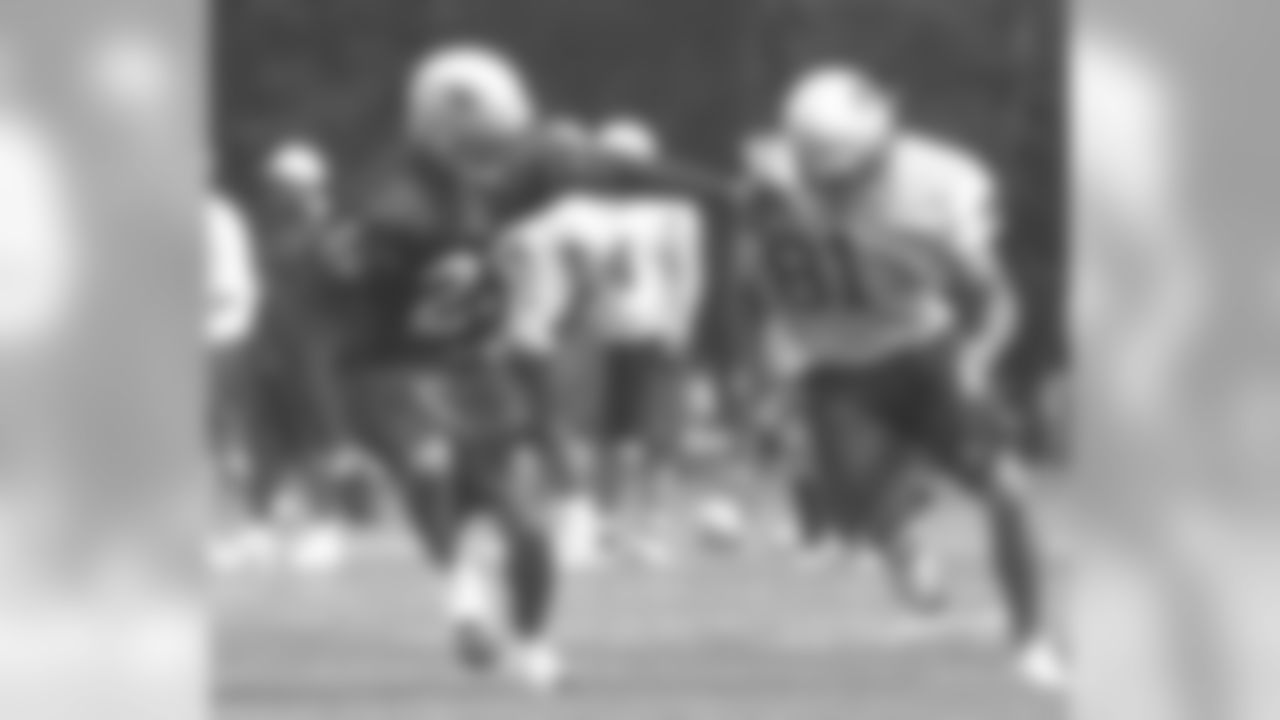 Cornerback Eric Warfield(23) shows good coverage skills while matching up with wide receiver Erik Davis(19) during afternoon practice session on Thursday, August 17. Photo by Chris Ferreira
