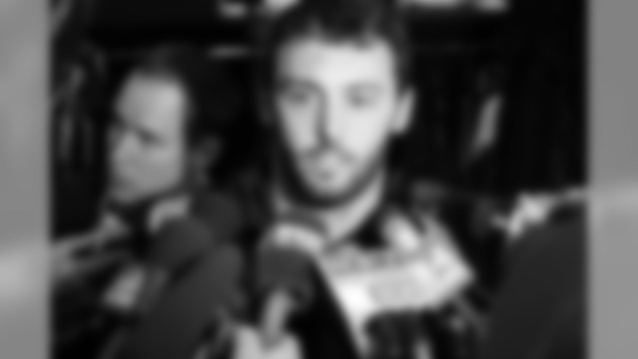Steve Gregory talks with the media