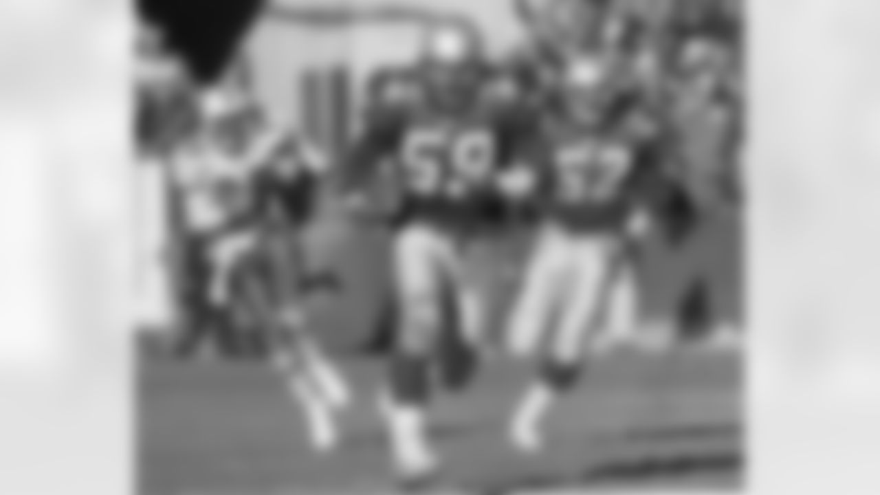 Dec. 28, 1997. Defense carried the day, as the Patriots claimed their first-ever wild card win at home, shutting down the Dolphins 17-3 at Foxboro Stadium. A 24-yard 2nd quarter TD reception by Troy Brown from Drew Bledsoe and a 40-yard interception return for a TD by Tony Collins (pictured) in the 3rd quarter accounted for the Pats' two TDs.