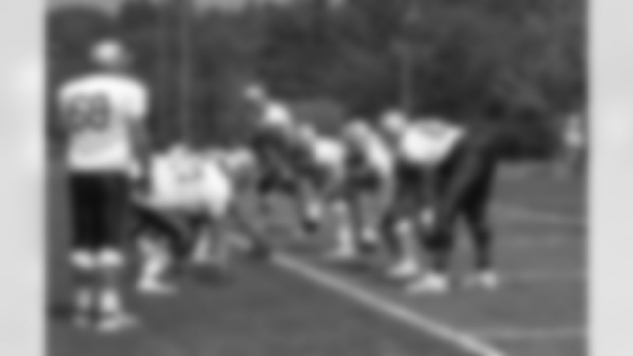 Patriots offensive lineman prepare to run through a blocking drill during the afternoon practice session on day four of Training Camp at Gillette Stadium. 7/30/2007 Photo by Chris Ferreira