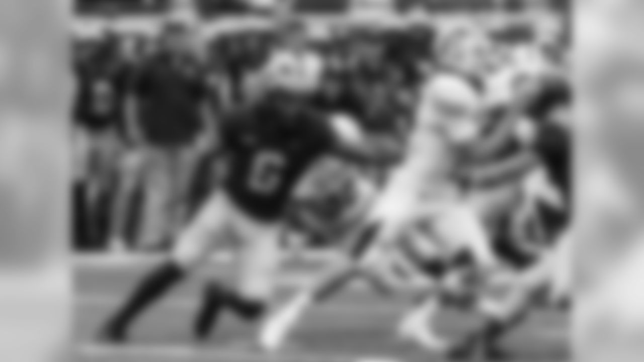 Michigan linebacker Josh Uche (6) pressures Western Michigan quarterback Jon Wassink (16) in the second quarter of an NCAA college football game in Ann Arbor, Mich., Saturday, Sept. 8, 2018. (AP Photo/Tony Ding)