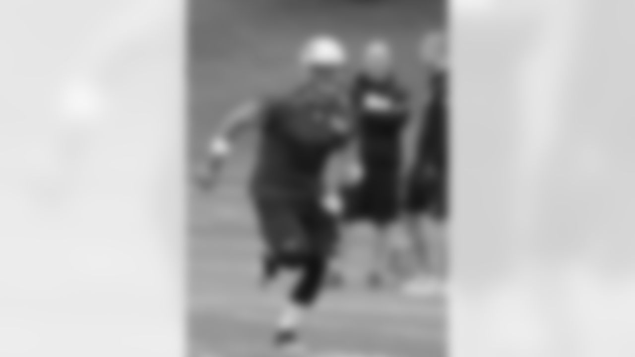 Tim Tebow sprints on to the field