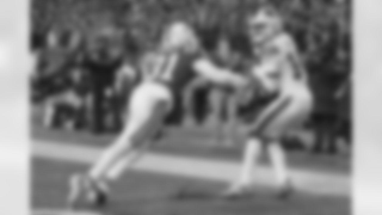 Buffalo Bills wide receiver Stefon Diggs (14) hangs onto the ball on his touchdown catch against New England Patriots cornerback Jonathan Jones (31).