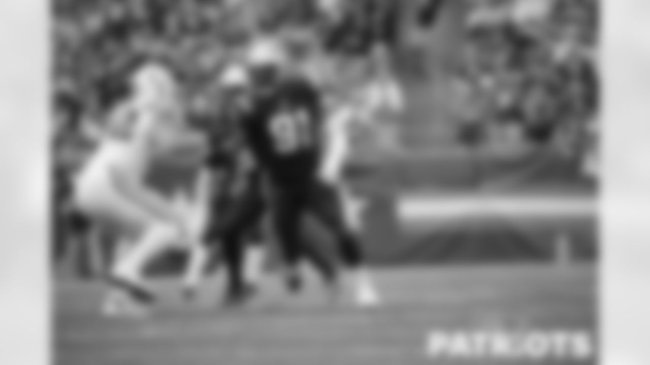 Deatrich Wise rushing the passer after the snap