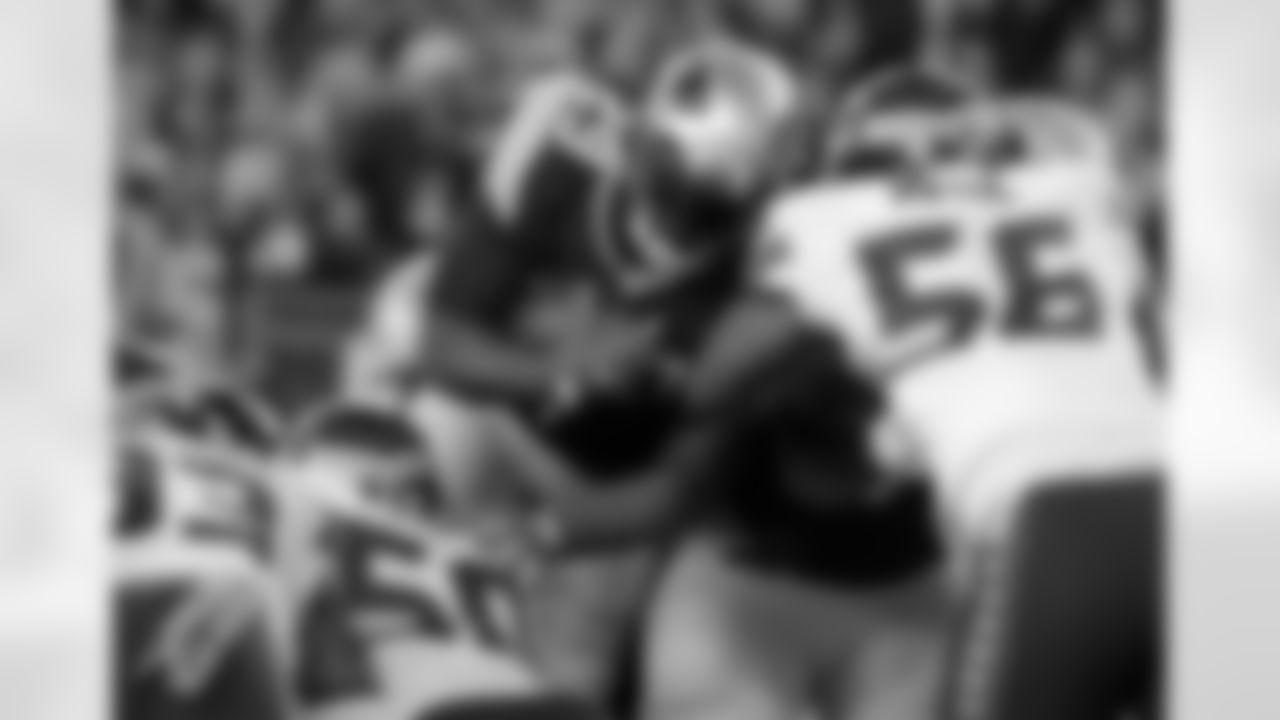 Seattle Seahawks defenders Tony McDaniel, (93), K.J. Wright (50) and Cliff Avril (56) stop New England Patriots running back LeGarrette Blount (29) at the goal line near the end of an NFL football game, Sunday, Nov. 13, 2016, in Foxborough, Mass. The Seahawks won 31-24. (AP Photo/Steven Senne)