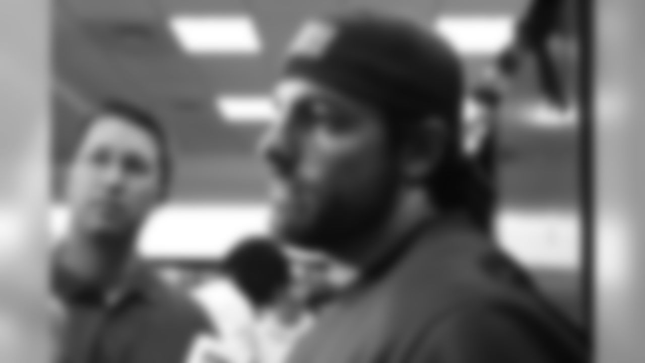 Nate Ebner talks with the media