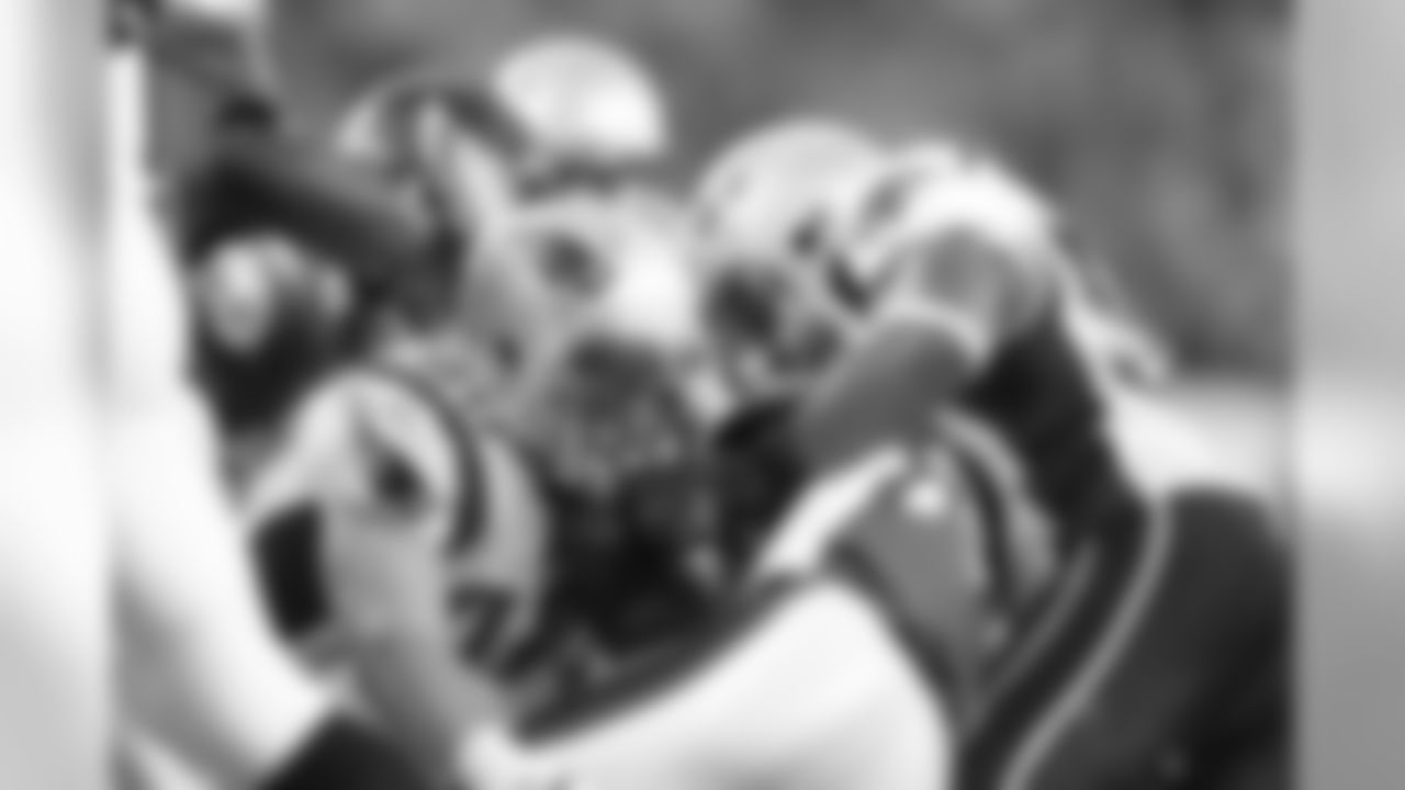 Patriots LB Niko Koutouvides and Tracy White make a special teams tackle in the Patriots 38-20 win